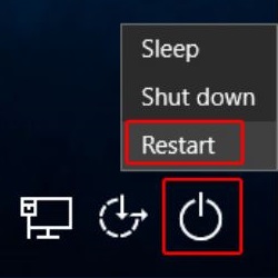 Windows login screen, power button, restart