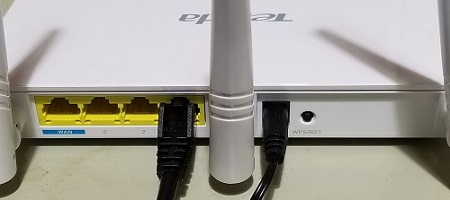 Ethernet cable plugged into LAN port