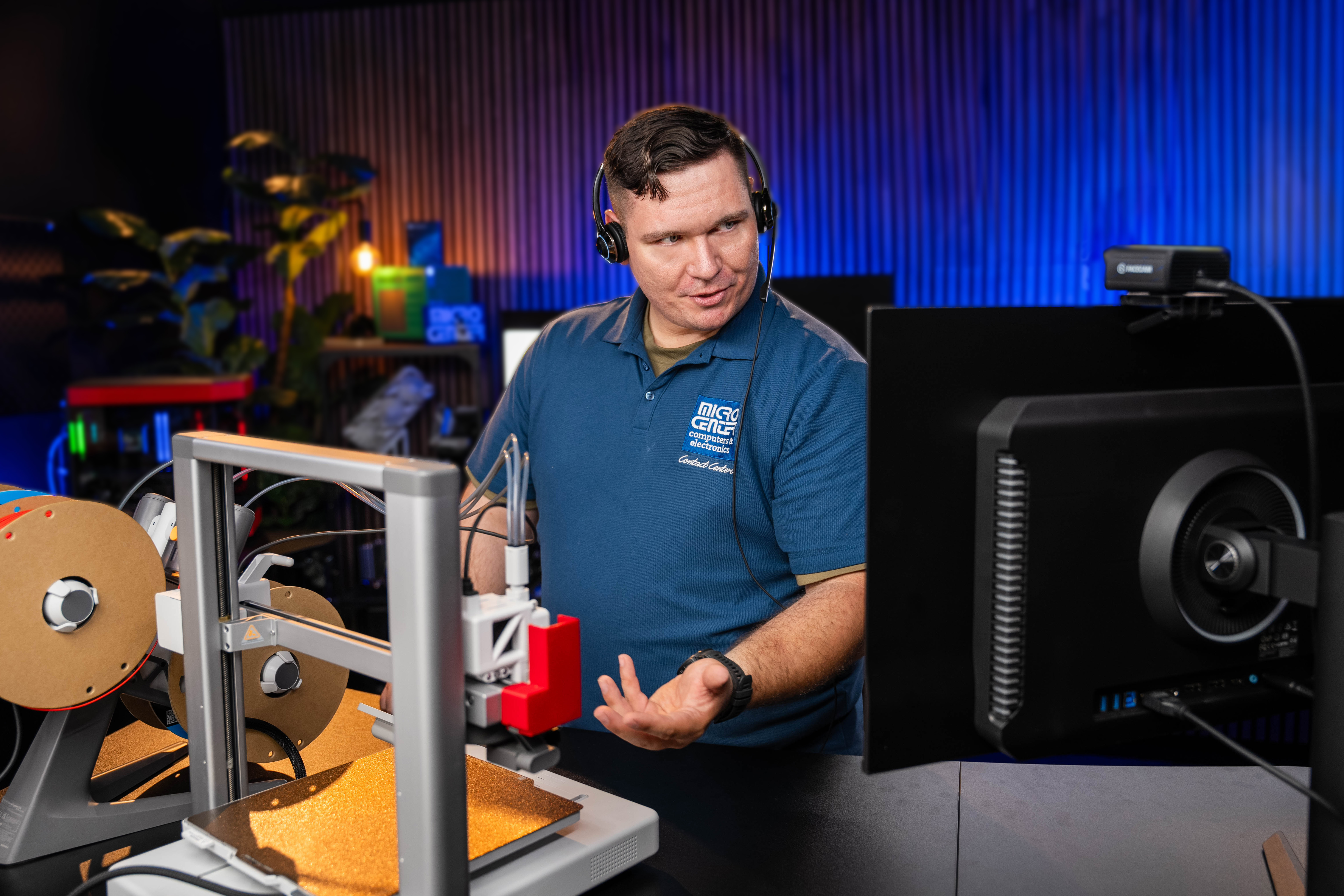 Technician working on a 3D printer