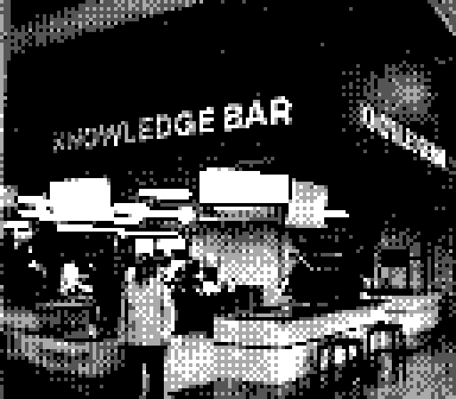 a Game Boy Camera photo of the Santa Clara Micro Center Knowledge Bar