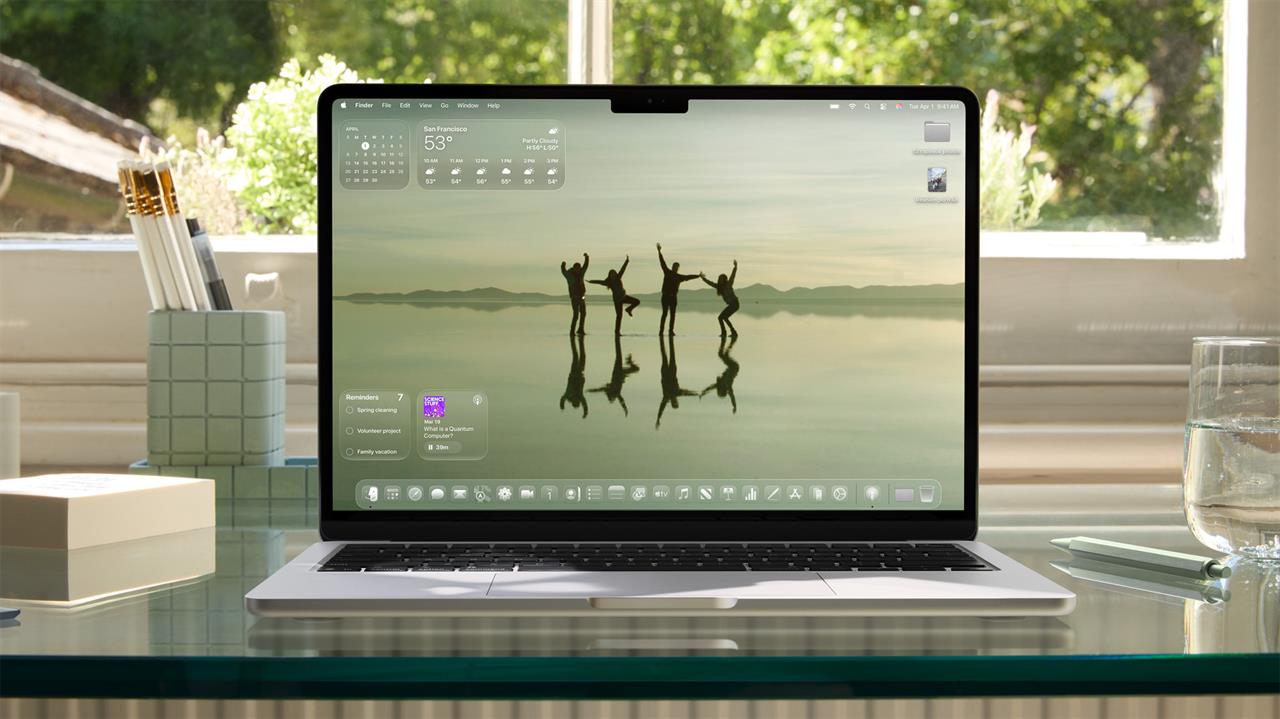 A MacBook showing macOS 26. 