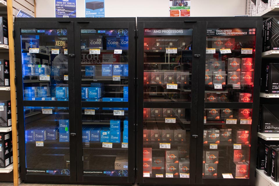 AMD and Intel CPUs in display case