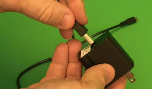 plugging USB end into the AC adapter