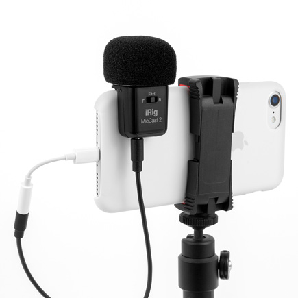 IK Multimedia iRig Mic Cast 2 Voice Recording Microphone with microphone shield connected to a smartphone