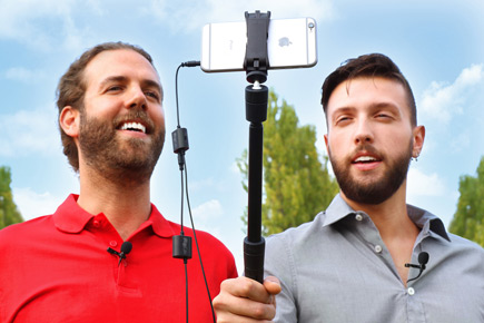 IK Multimedia iRig Lavalier Microphones on two guys filming with a smart phone