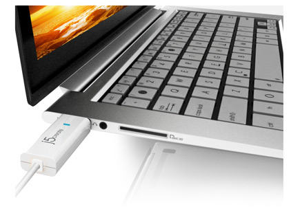Laptop connected to the j5create USB 2.0 Male Wormhole Switch Transfer Cable