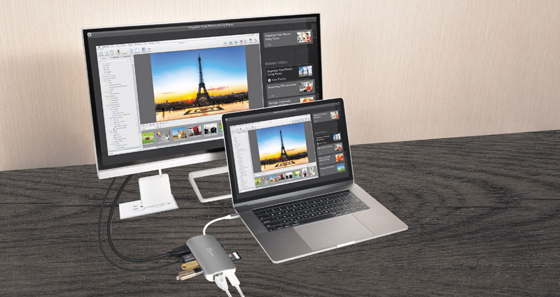 Laptop and Monitor connected by adapter displaying the same content.