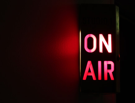 Lighted On Air studio sign