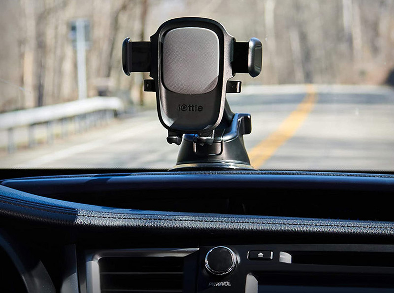 iOttie phone mount pictured on a car dashboard