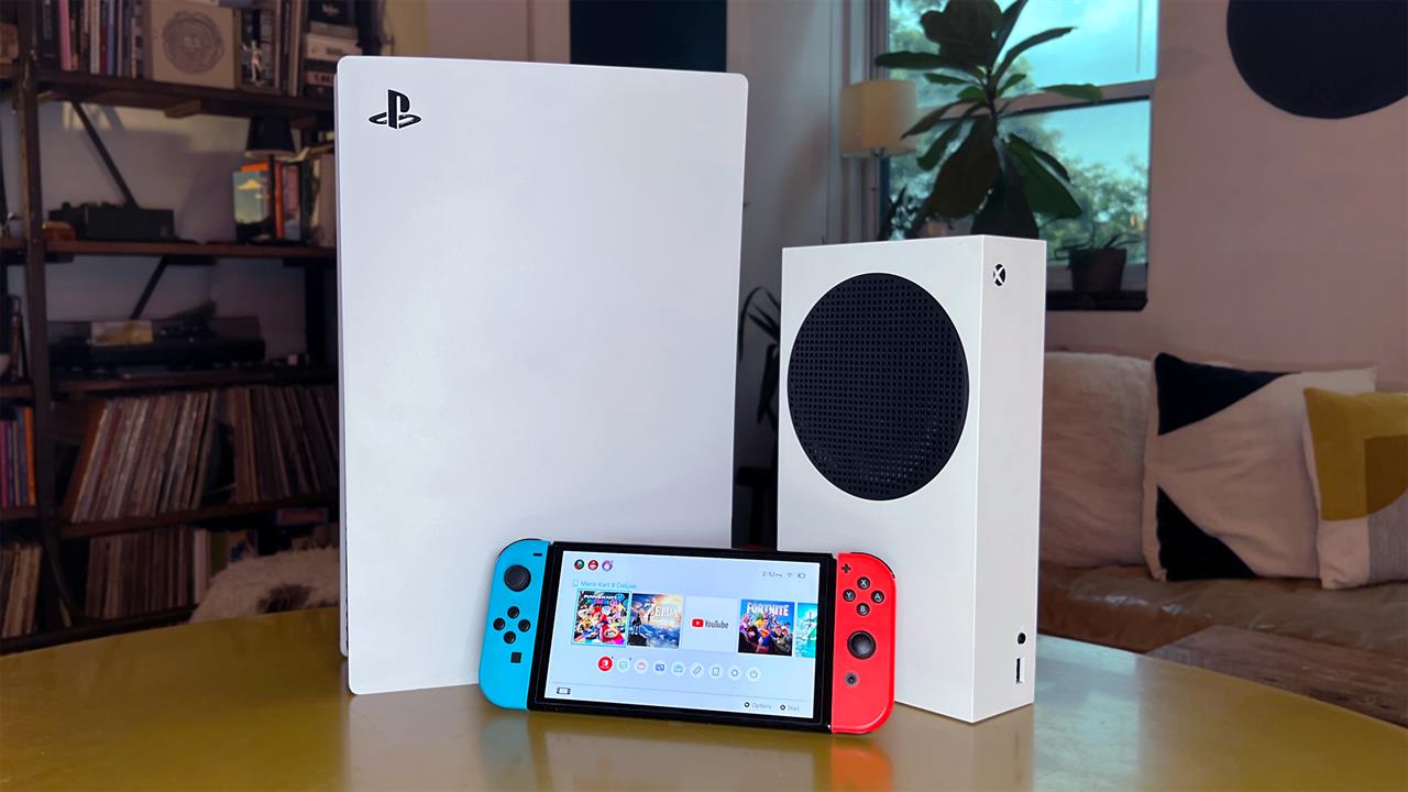 Game consoles on a table.
