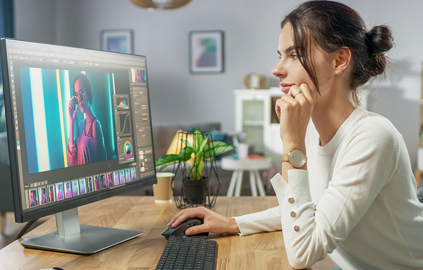 Young woman viewing computer screen