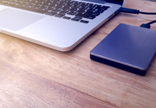 Laptop with external hard drive back up