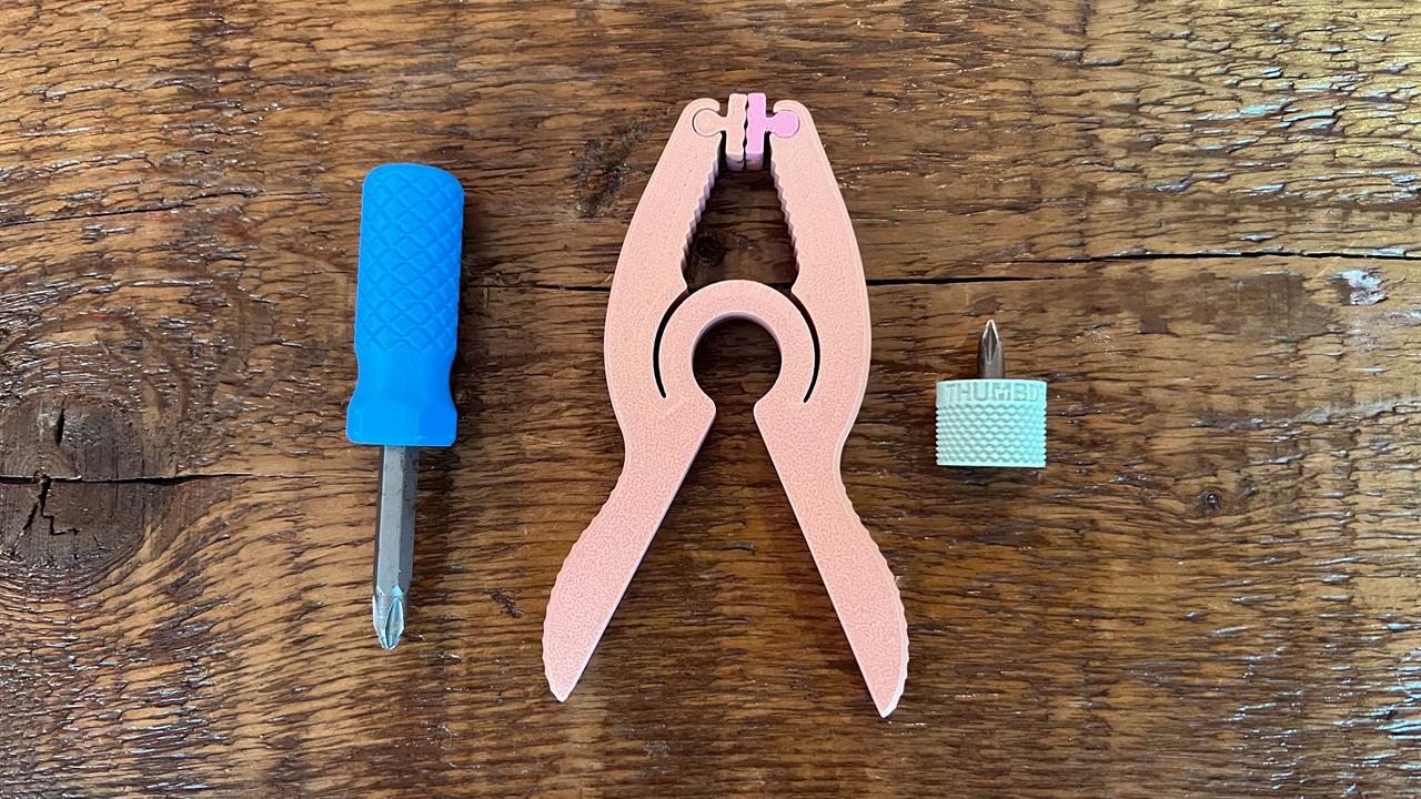 A 3D printed clamp and bit drivers.