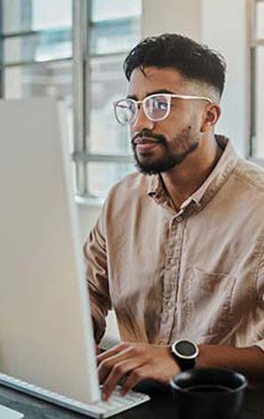 Man at desk purchasing JumpStart